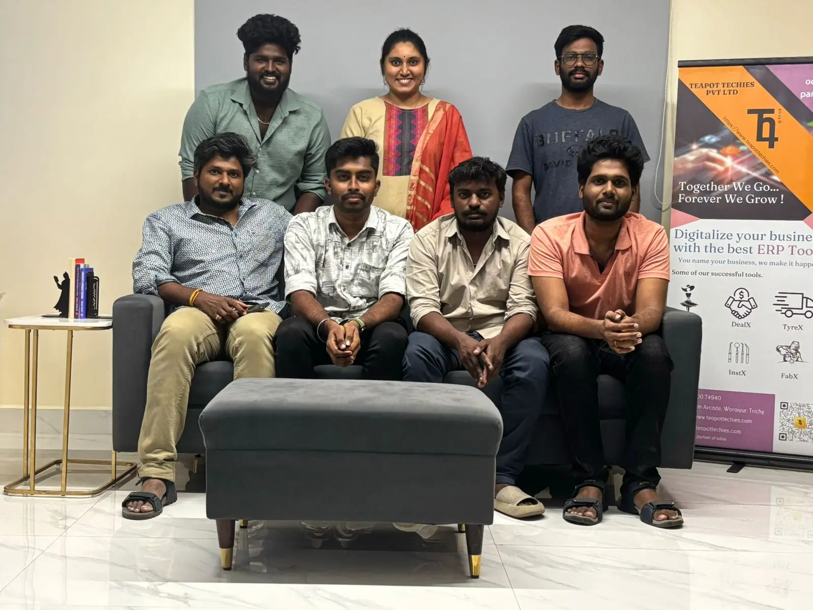 Team group photo beside the Teapot Techies banner