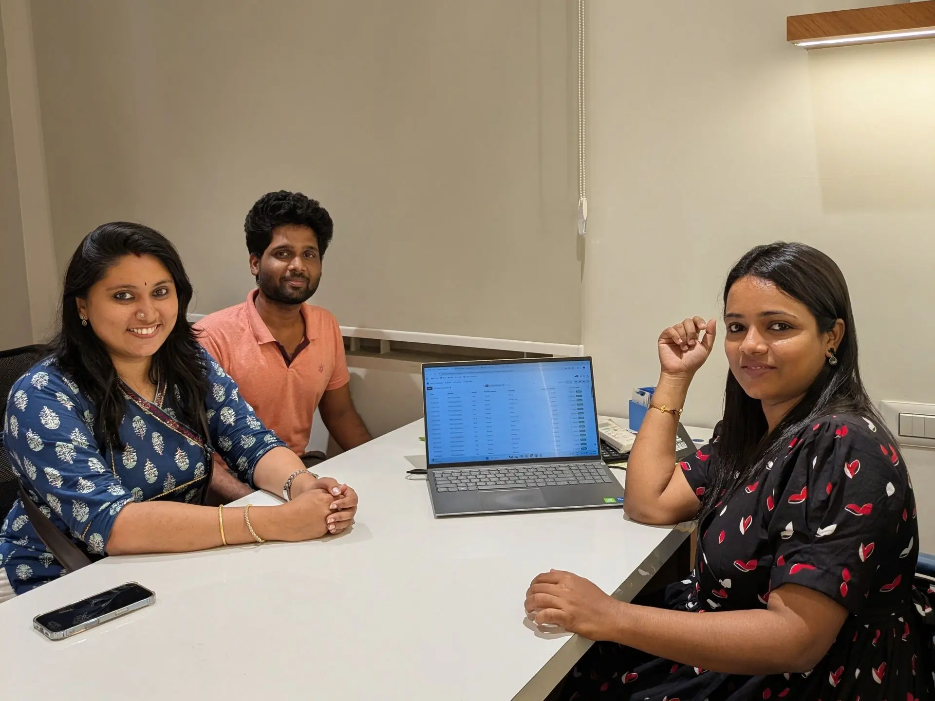 Colleagues working together at a meeting table